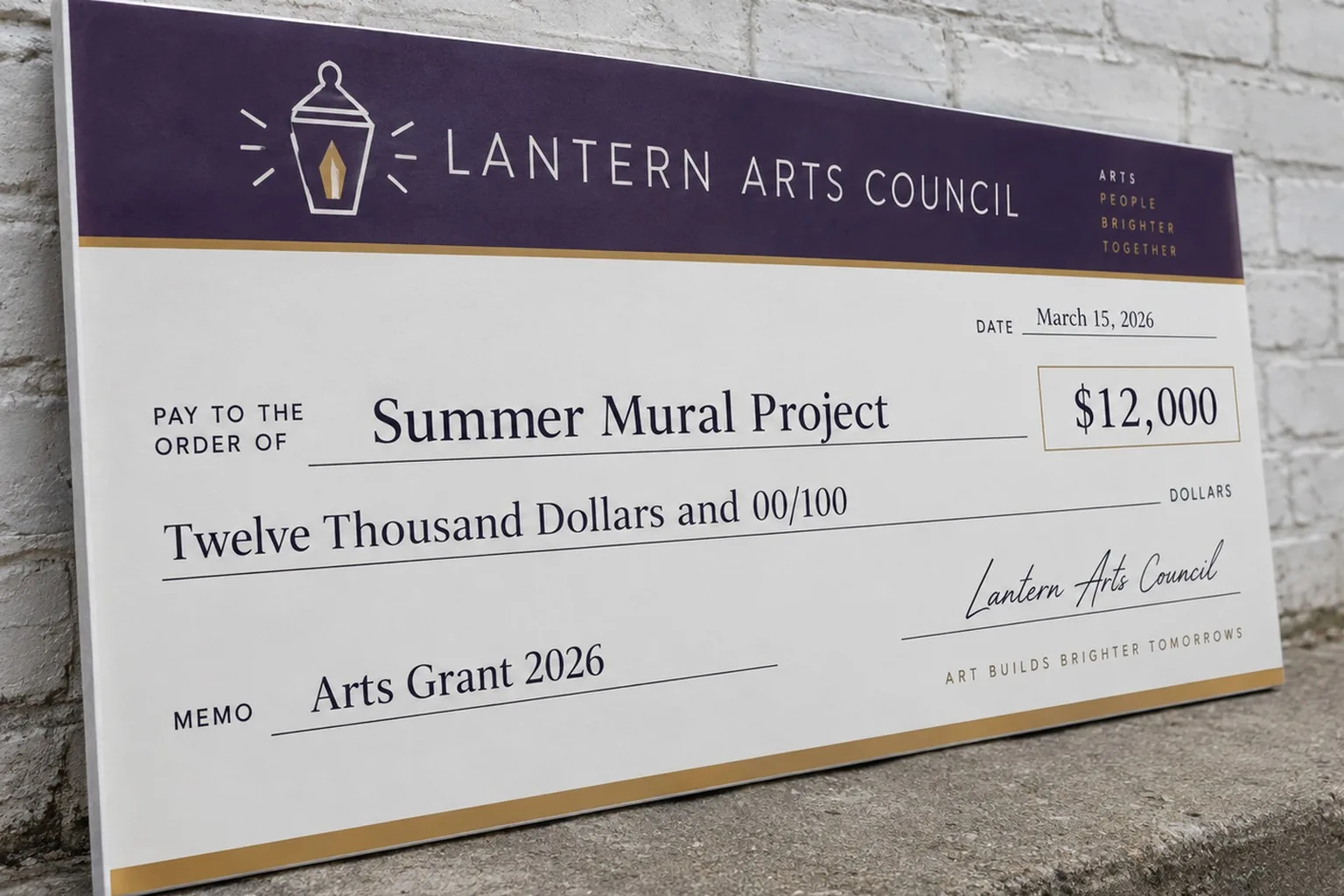 Custom giant check leaning against a brick wall