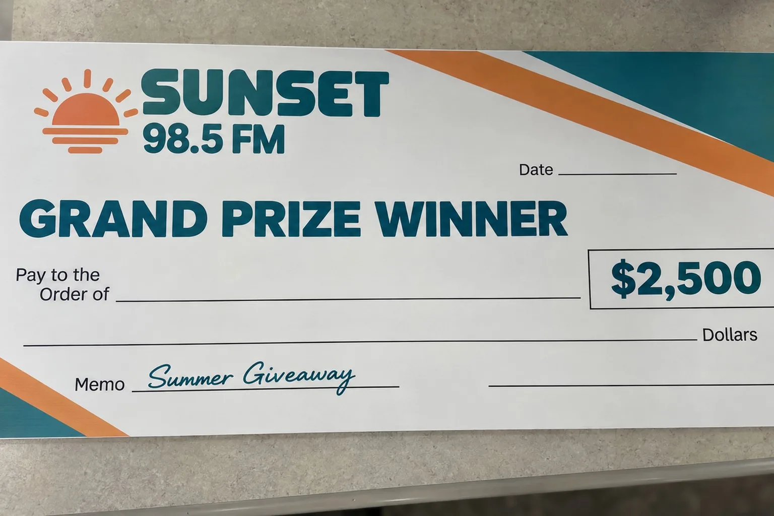 Custom giant sweepstakes prize check on a store counter